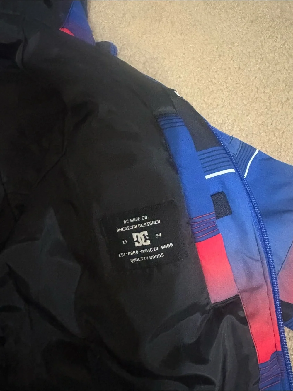 DC Hooded Puffer Jacket in Blue, Red & Black